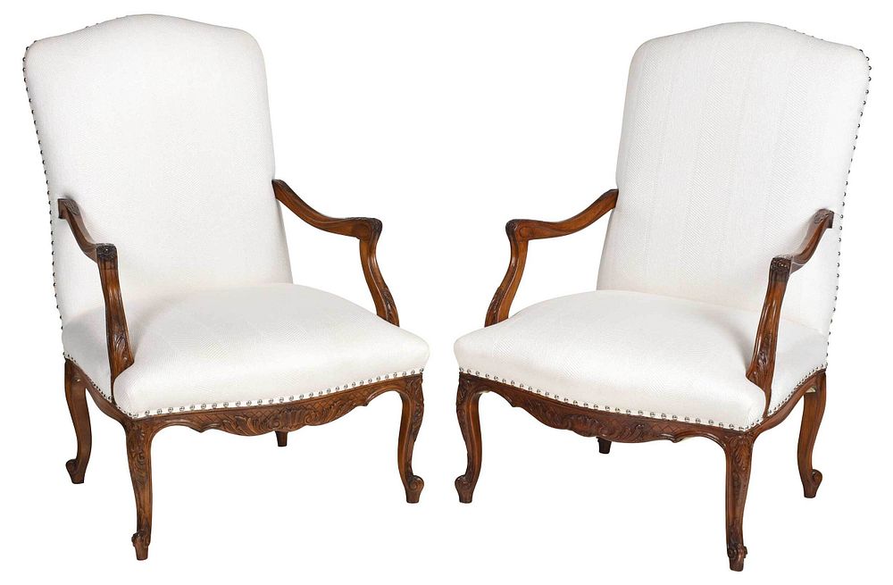 Appraisal: Pair Provincial Louis XV Style Carved Armchairs th century each