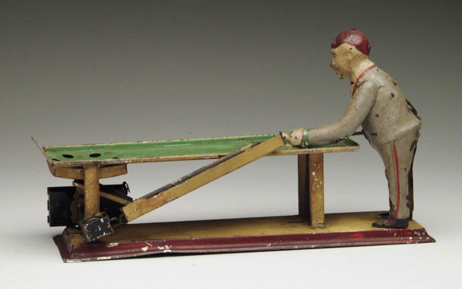 Appraisal: HAND-PAINTED POOL PLAYER Pool player is painted gray with flesh