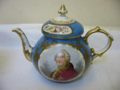 Appraisal: A FRENCH PORCELAIN TEAPOT AND COVER of globular form painted