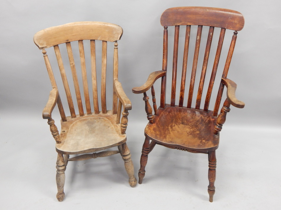 Appraisal: Two thC slate back Windsor chairs each with a shaped