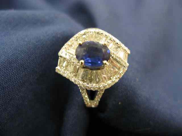 Appraisal: Sapphire Diamond Ring carat oval rich blue gem surrounded by