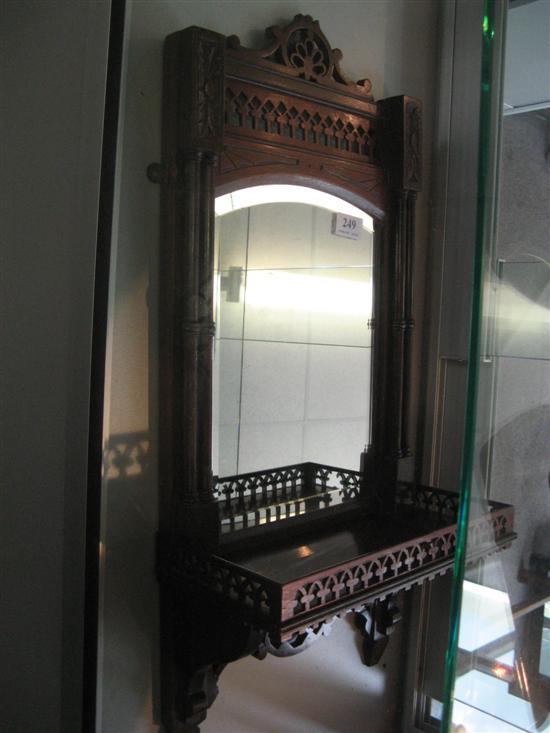 Appraisal: Small mahogany mirror backed wall shelf with carved and pierced