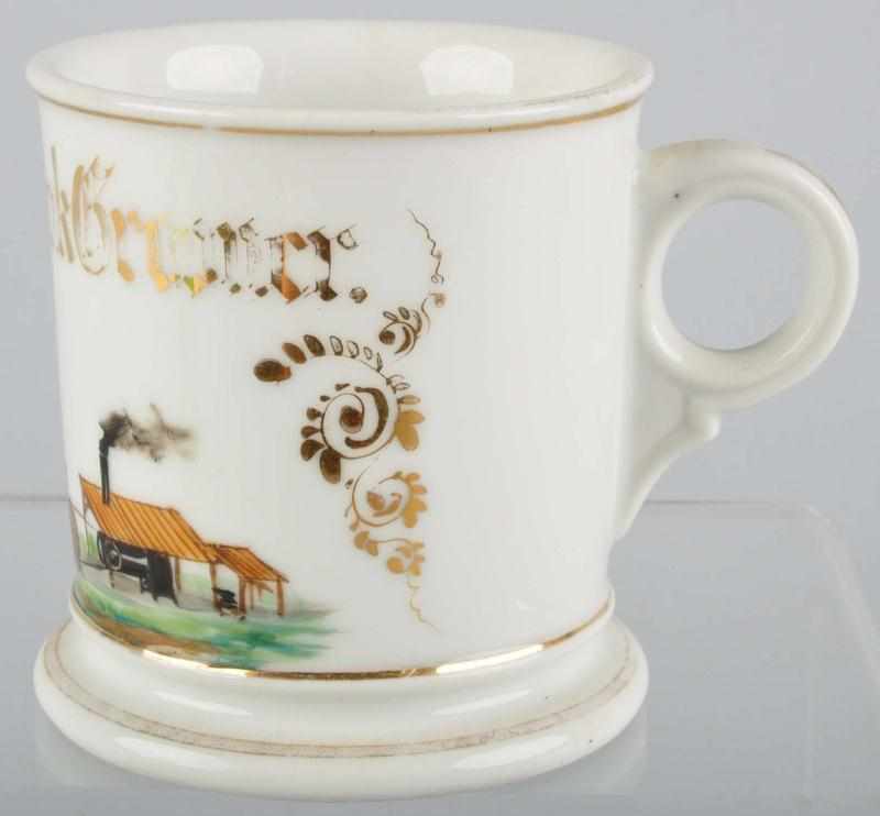 Appraisal: Steam-Driven Derrick Shaving Mug Description Marked Frank Grooner across front