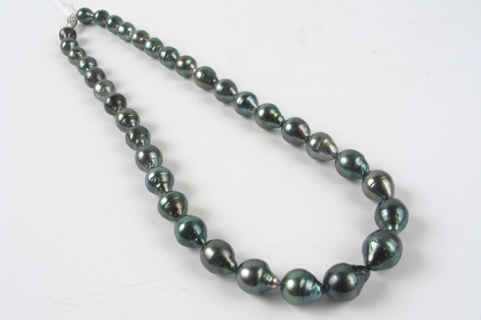 Appraisal: BLACK PEARL AND FOURTEEN KARAT WHITE GOLD NECKLACE with baroque