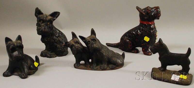 Appraisal: Five Painted Cast Iron Scottie Dog Doorstops America nd quarter-