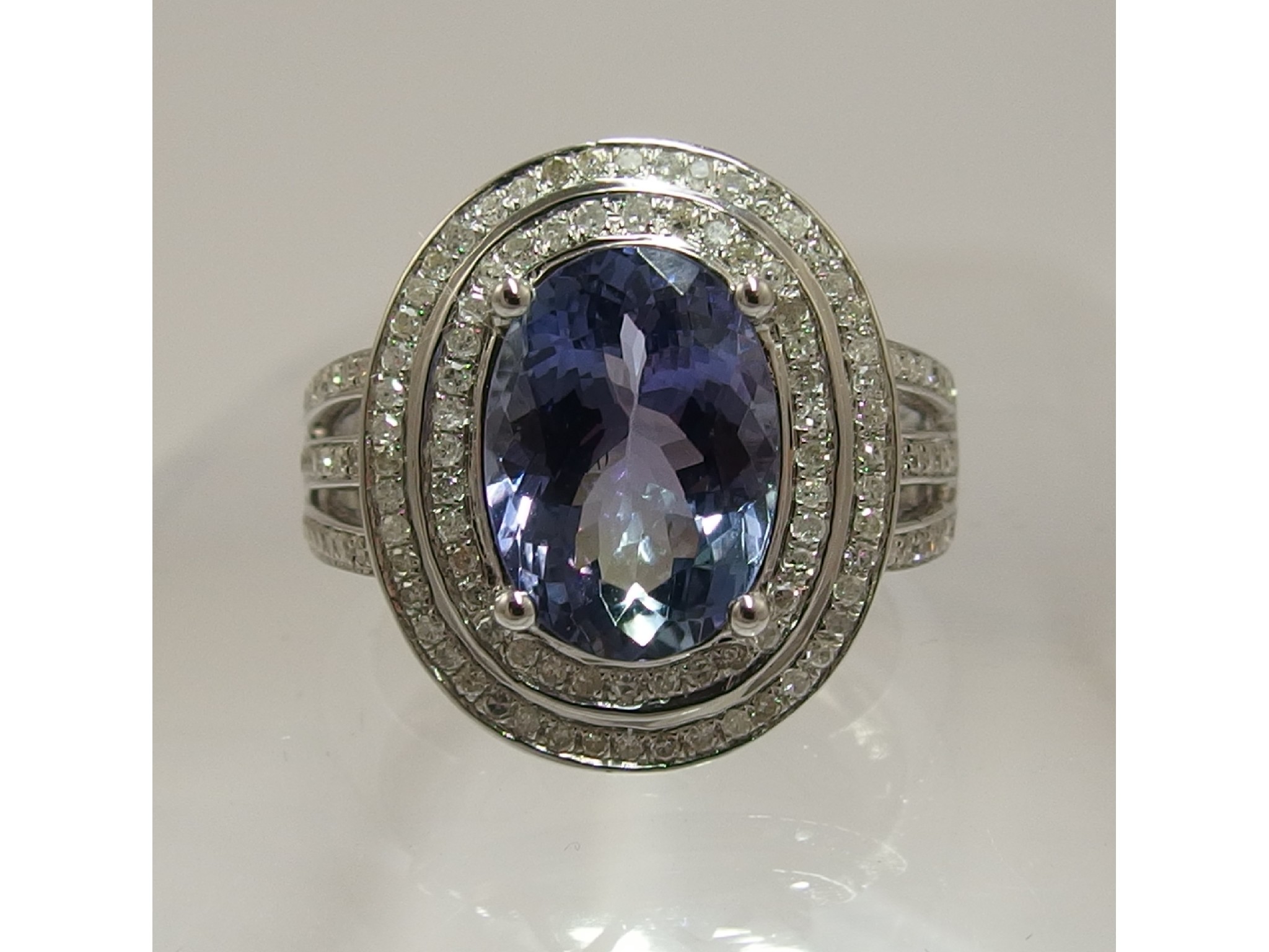 Appraisal: A ct white gold diamond and tanzanite ringset with an