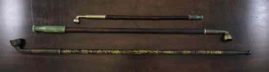 Appraisal: Three Chinese opium pipes th century two with spinach green