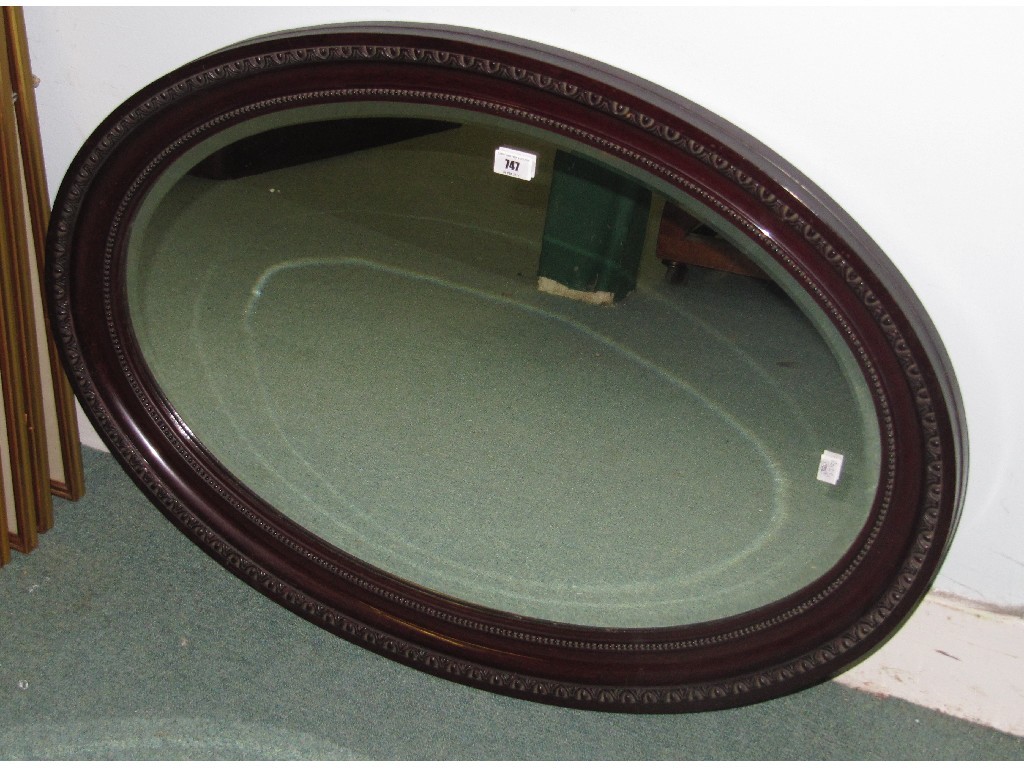 Appraisal: Oval mahogany framed wall mirror