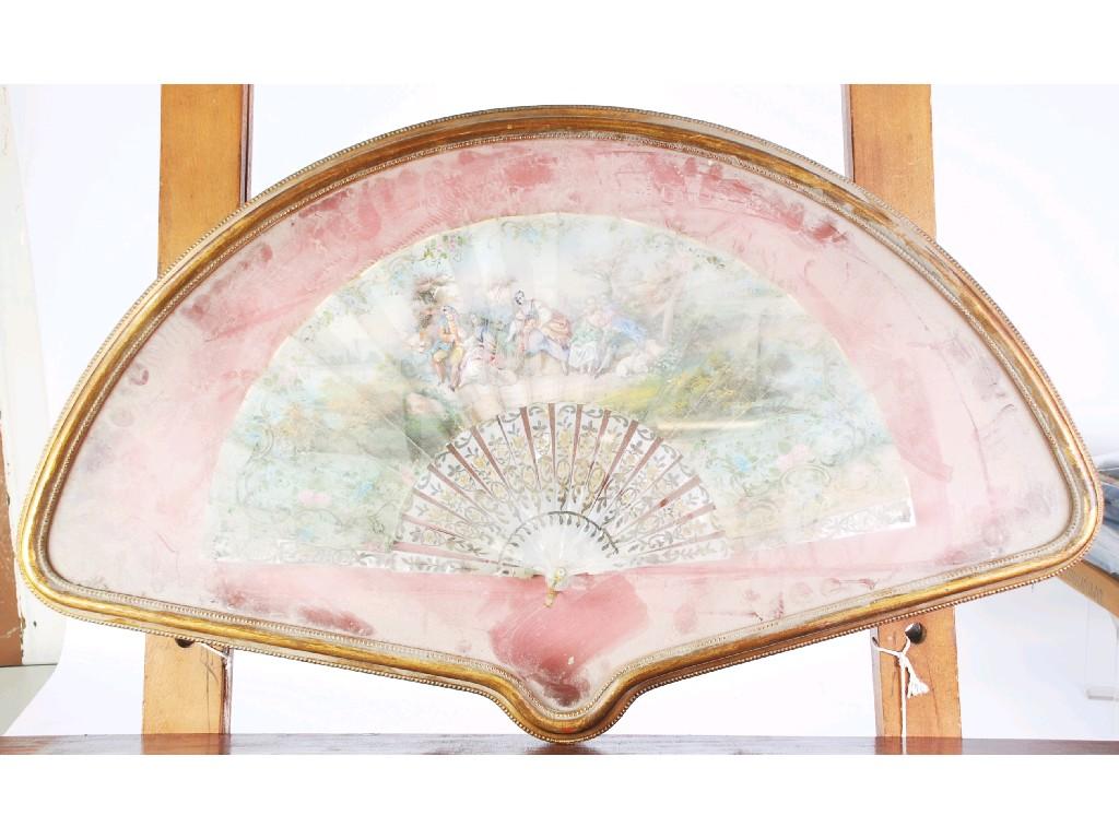 Appraisal: CONTINETNAL PAINTED PAPER LEAF FAN decorated with a scene of