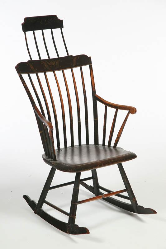 Appraisal: COMB-BACK WINDSOR ROCKER American th century mixed woods Armchair with