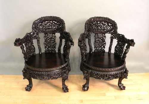 Appraisal: Pair of carved Chinese armchairs