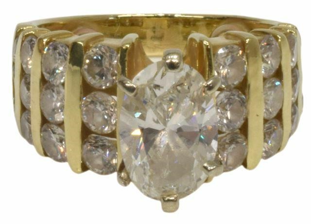 Appraisal: Estate kt yellow gold tested and diamond wedding ring featuring