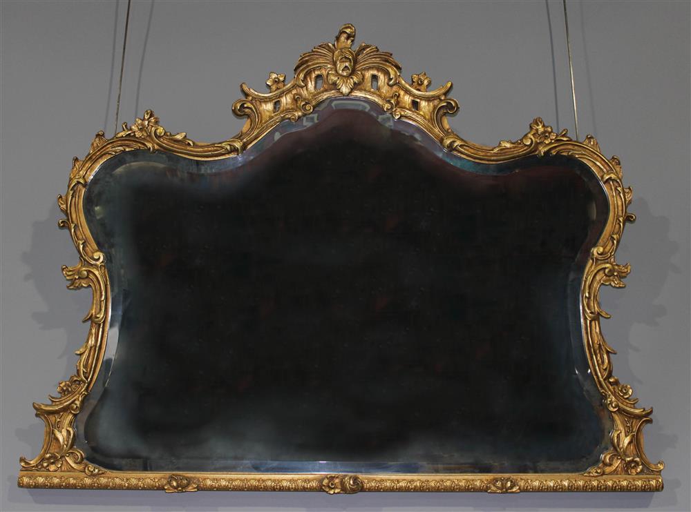 Appraisal: F B DECORATIVE ARTS CHIPPENDALE STYLE CARVED AND GILT MIRROR