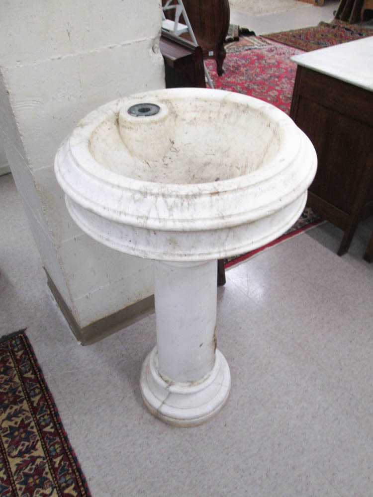 Appraisal: WHITE MARBLE GARDEN FOUNTAIN early th century featuring a round