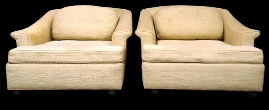 Appraisal: Pair of Dunbar upholstered armchairs straight back with shaped arms