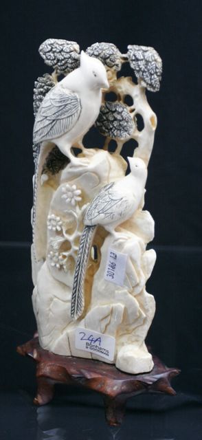 Appraisal: An ivory figural group of birds cms high