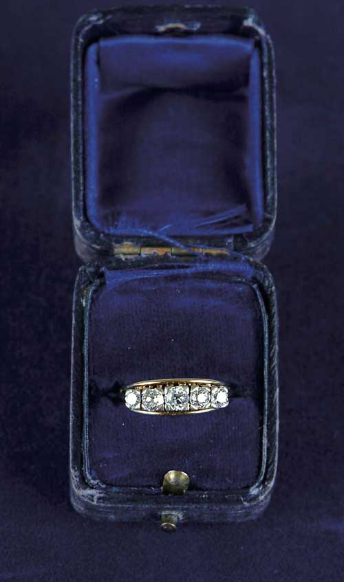 Appraisal: DIAMOND AND YELLOW GOLD ENGAGEMENT RING A wire ring set