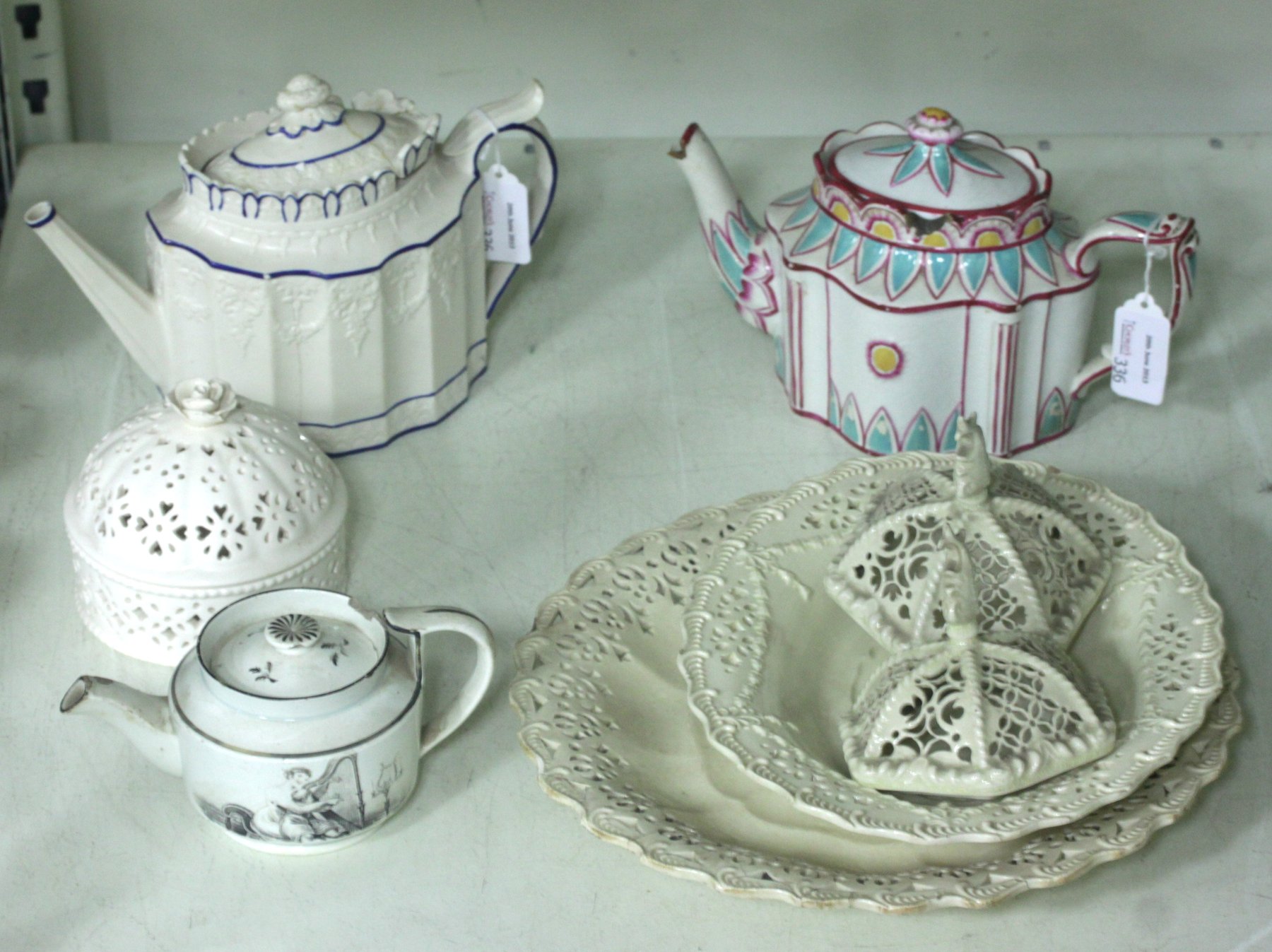 Appraisal: Two early th Century pottery teapots and covers a creamware