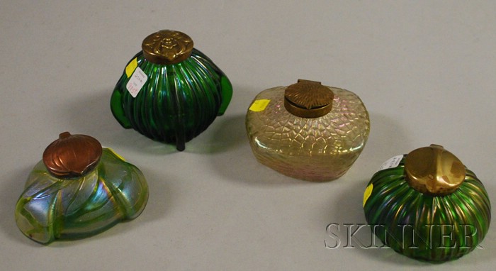 Appraisal: Four Bohemian Iridescent Art Glass Inkwells mounted with brass and