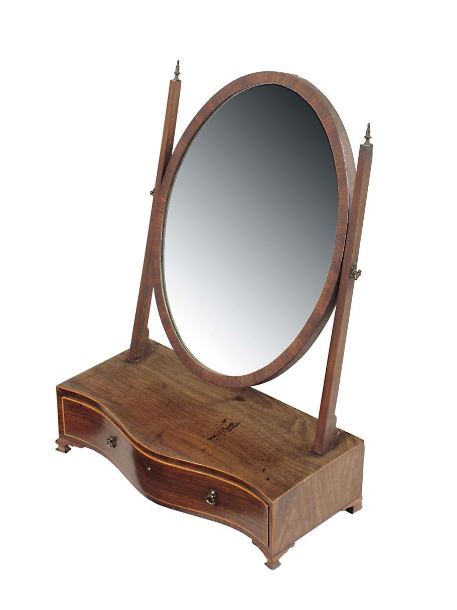 Appraisal: A late George III mahogany toilet mirror