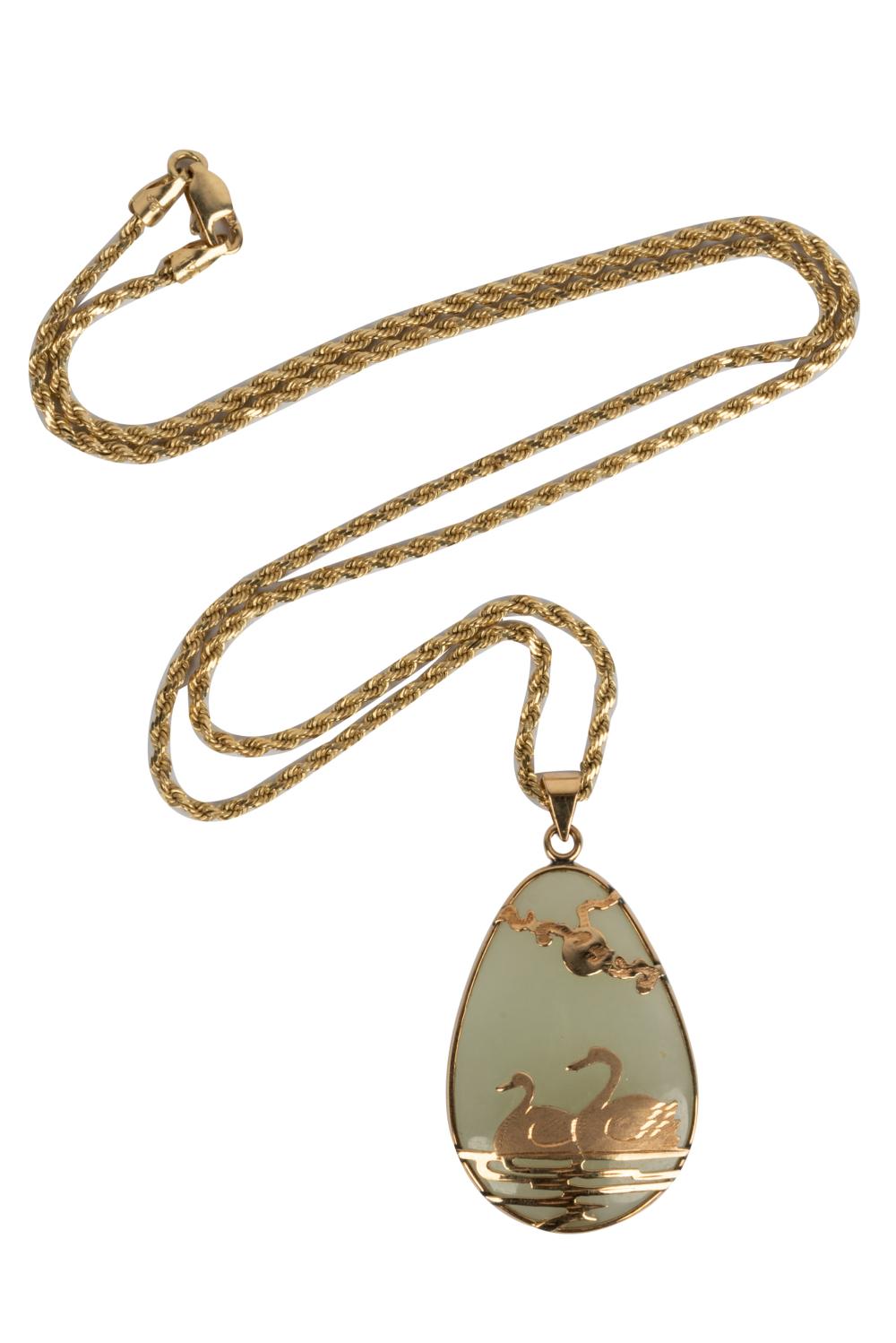 Appraisal: KARAT YELLOW GOLD JADE PENDANT NECKLACEthe pendant containing a pear