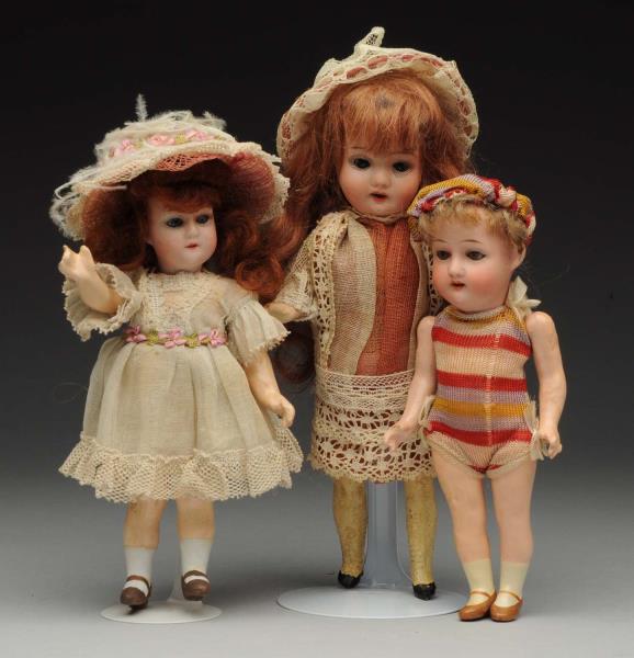 Appraisal: Lot Of German Bisque Dolls All with bisque heads glass