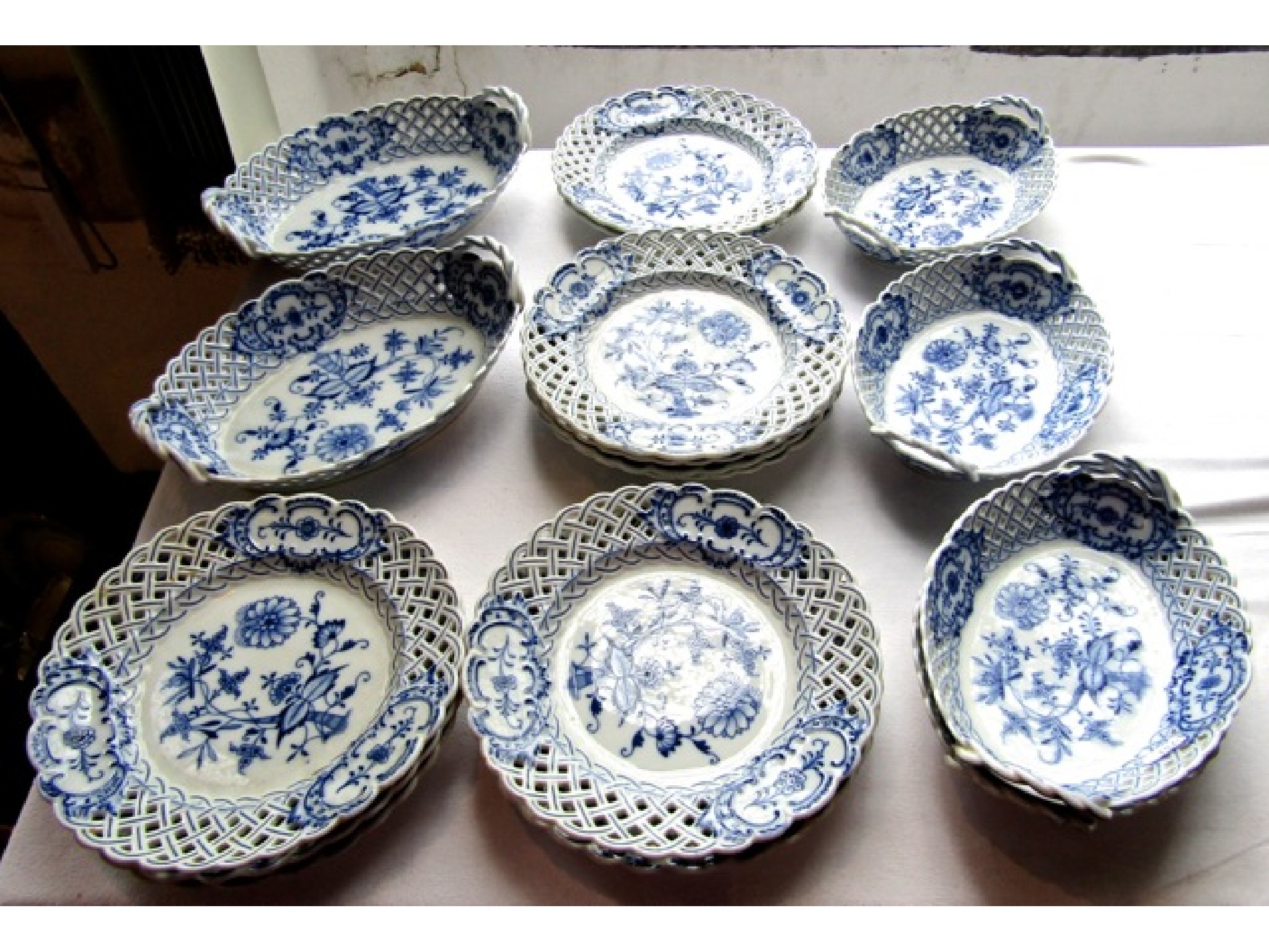 Appraisal: A collection of th century Meissen dessert wares with blue