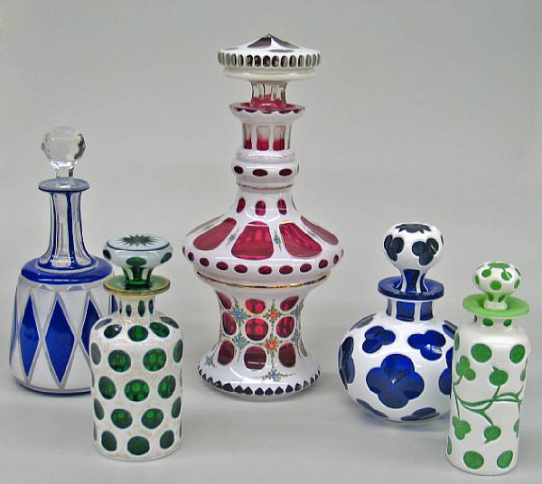 Appraisal: Five Bohemian opaque cased cut to clear glass decanters or