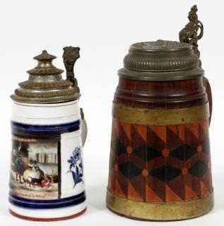 Appraisal: GERMAN PORCELAIN WOOD STEINS TH C TWO GERMAN PORCELAIN WOOD