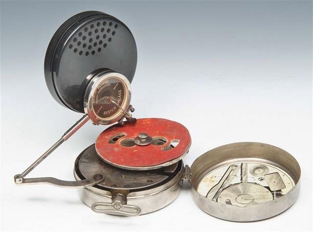 Appraisal: A MIKIPHONE POCKET PHONOGRAPH or record player with clockwork motion