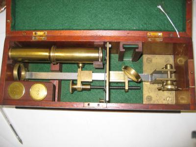 Appraisal: A GILT BRASS MONOCULAR TRAVELLING MICROSCOPE by L Shimwell the