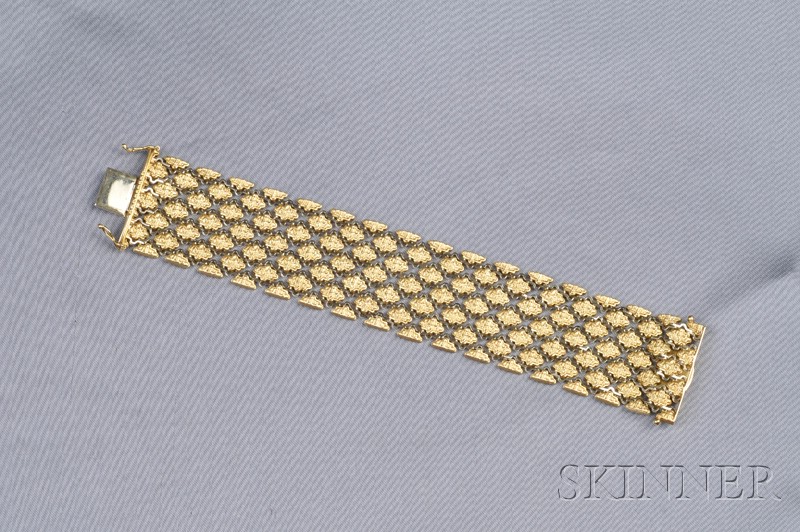 Appraisal: kt Bicolor Gold Bracelet the wide strap of shaped textured