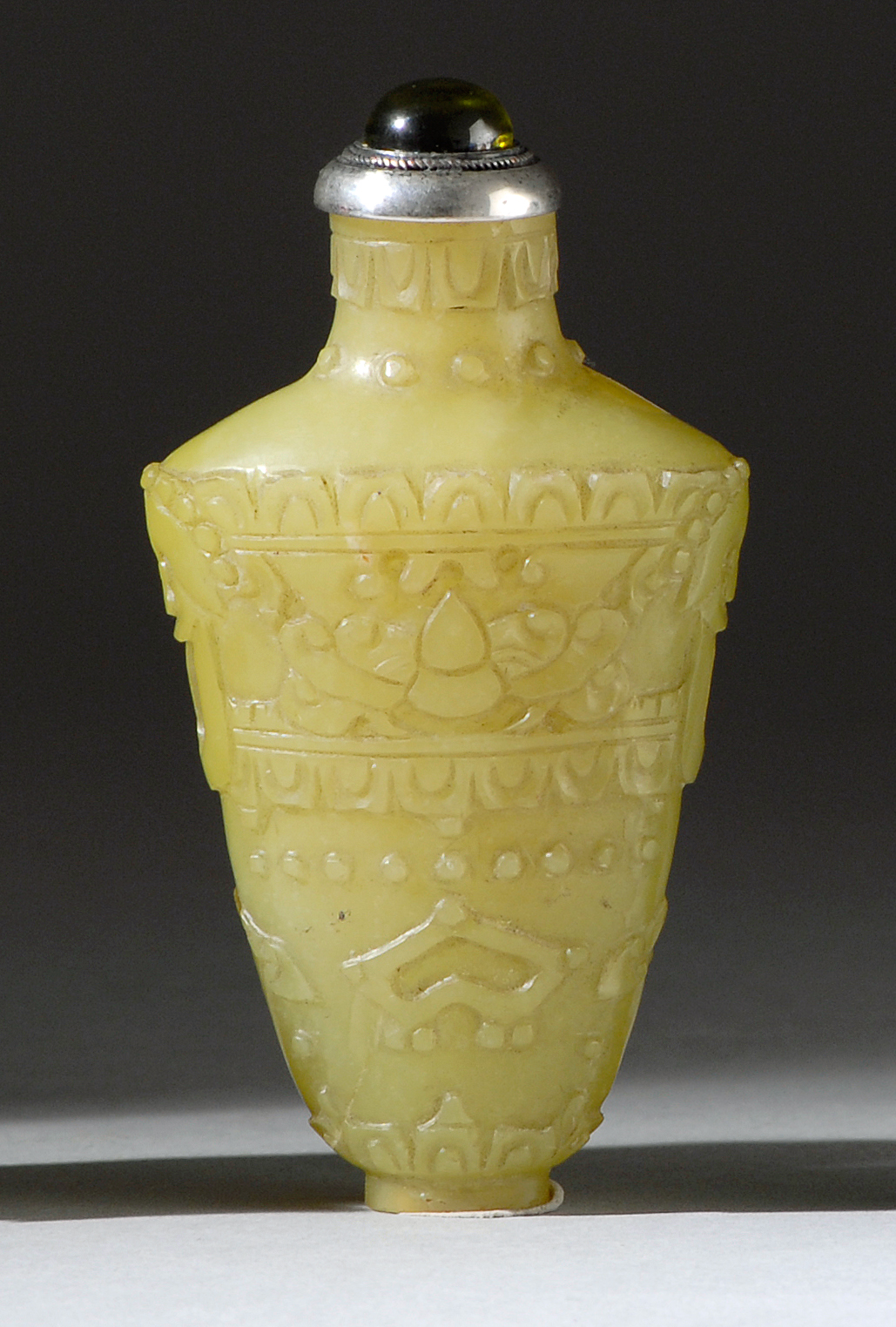 Appraisal: TRANSLUCENT YELLOW SOAPSTONE SNUFF BOTTLE Circa In spade shape with