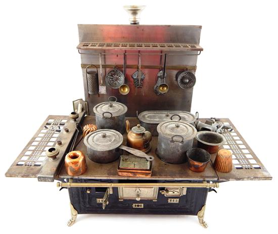 Appraisal: Late th C miniature cook stove with four burners and