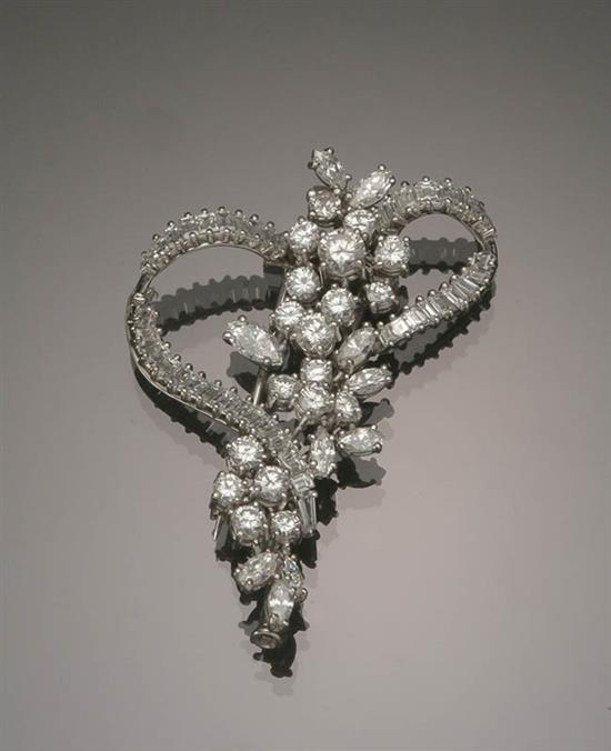 Appraisal: Tested Platinum and Diamond Brooch The stylized bow motif set