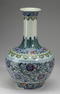 Appraisal: Chinese wucai bottle vase Qianlong mark h Chinese wucai bottle