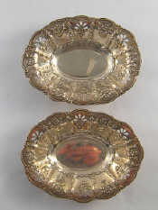 Appraisal: A pair of pierced silver bonbon dishes x cm