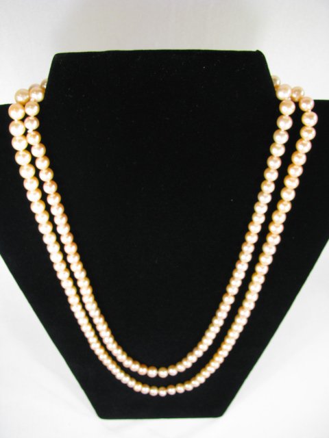 Appraisal: Natural cultured gold pink pearl three row pearls One strand