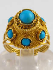 Appraisal: A yellow metal tests carat gold turquoise ring size I