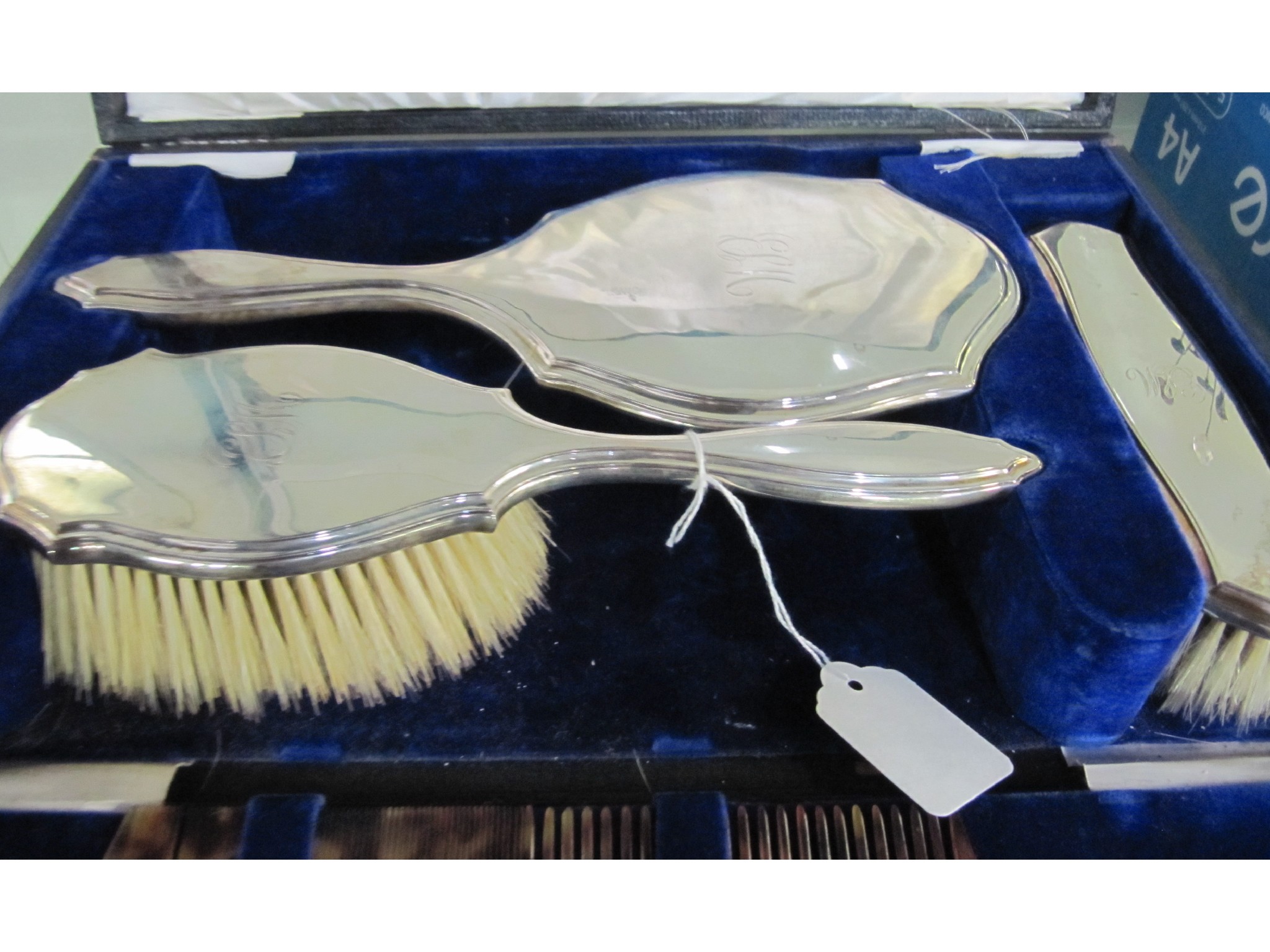 Appraisal: A cased four piece silver dressing table set London