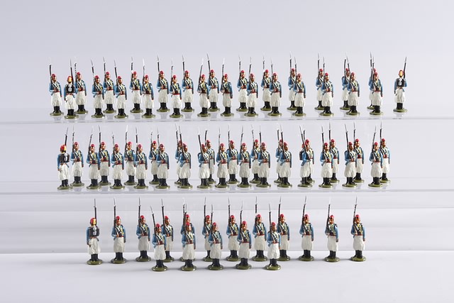 Appraisal: Lot of metal figures representing French Turco's standing at shoulder