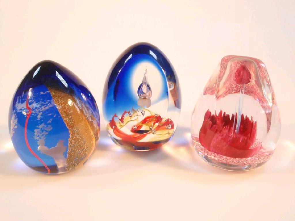 Appraisal: Three Caithness glass paperweights 'Abseil' another similar and 'Fantasy Orchard'