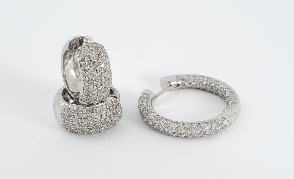 Appraisal: PR SCINTILLATING K WHITE GOLD AND PAVE SET DIAMOND EARRINGS