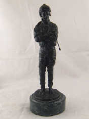 Appraisal: A bronze figure of a jockey Shoe incised signature Nina