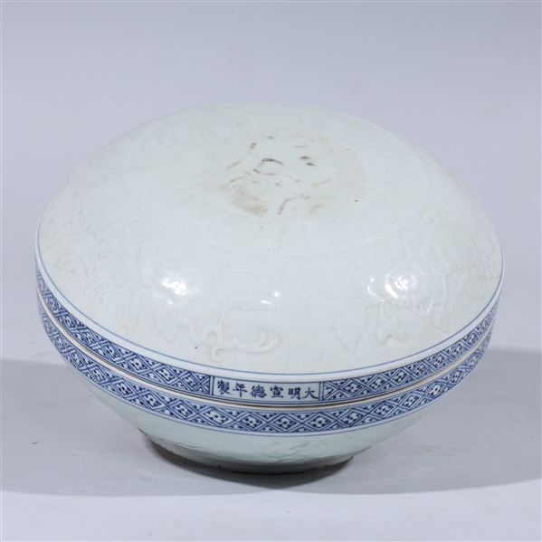 Appraisal: Chinese round porcelain blue and white covered box with floral