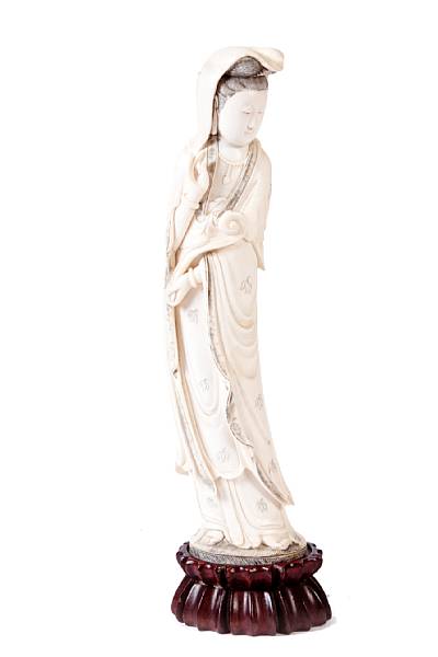 Appraisal: A Chinese ivory carving of a Beauty height in width