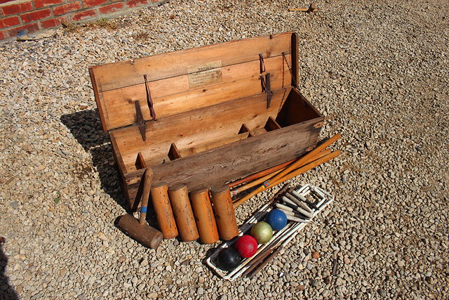 Appraisal: AN OLD CROQUET SET IN A PINE BOX with iron