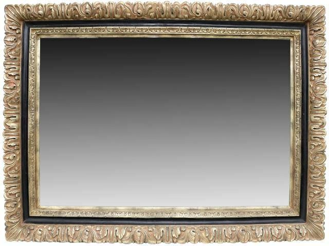 Appraisal: Monumental parcel gilt wall mirror th c having carved foliate