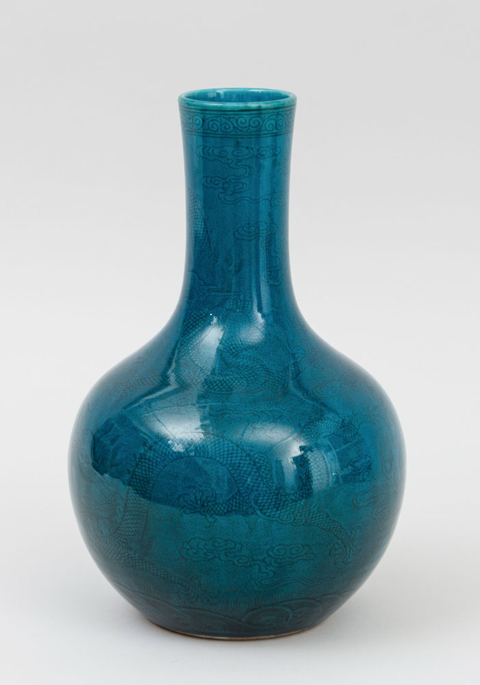 Appraisal: CHINESE DRAGON-INCISED TURQUOISE-GLAZED PORCELAIN BOTTLE VASE With underglaze incised six-character