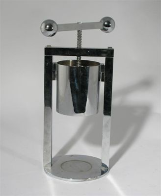 Appraisal: A chrome metal lemon squeezer in the style of Jacques